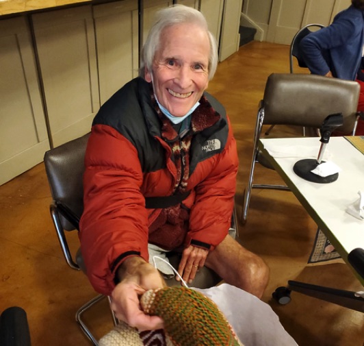 Burnetta Lamaire knit a beautiful blanket and presented it to Doug.